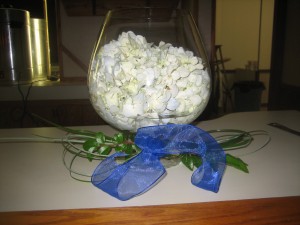 A bear grass bow decorates this bar arrangement.