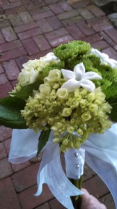 The bridesmaid bouquets were green hydrangea, green mums, and stephonitis