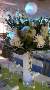 Flowers on pedistals decorated the tables.