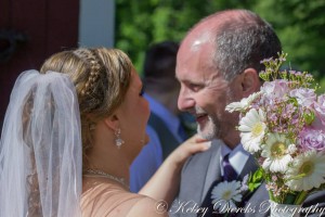 Caitlin's bouquet was white gerbera daiseys and lilac colored roses.