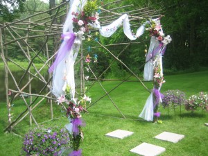 Her ceremony took place outdoors near a lovely pond.