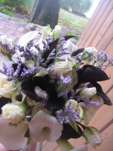 The bridal bouquet was purple and white calla lilies with sweetheart white roses.