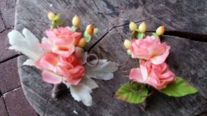 Boutonnieres were created in silks.
