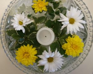 Tables were decorated with floating arrangements.