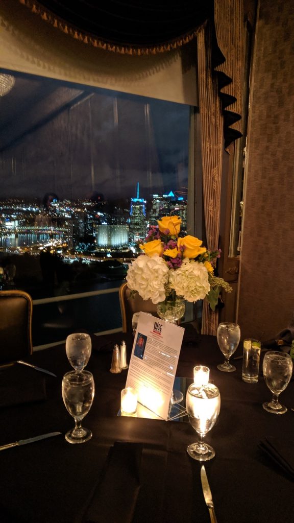 Tall vases were used for this event held at the Lemont to honor Pitt's athletic director.